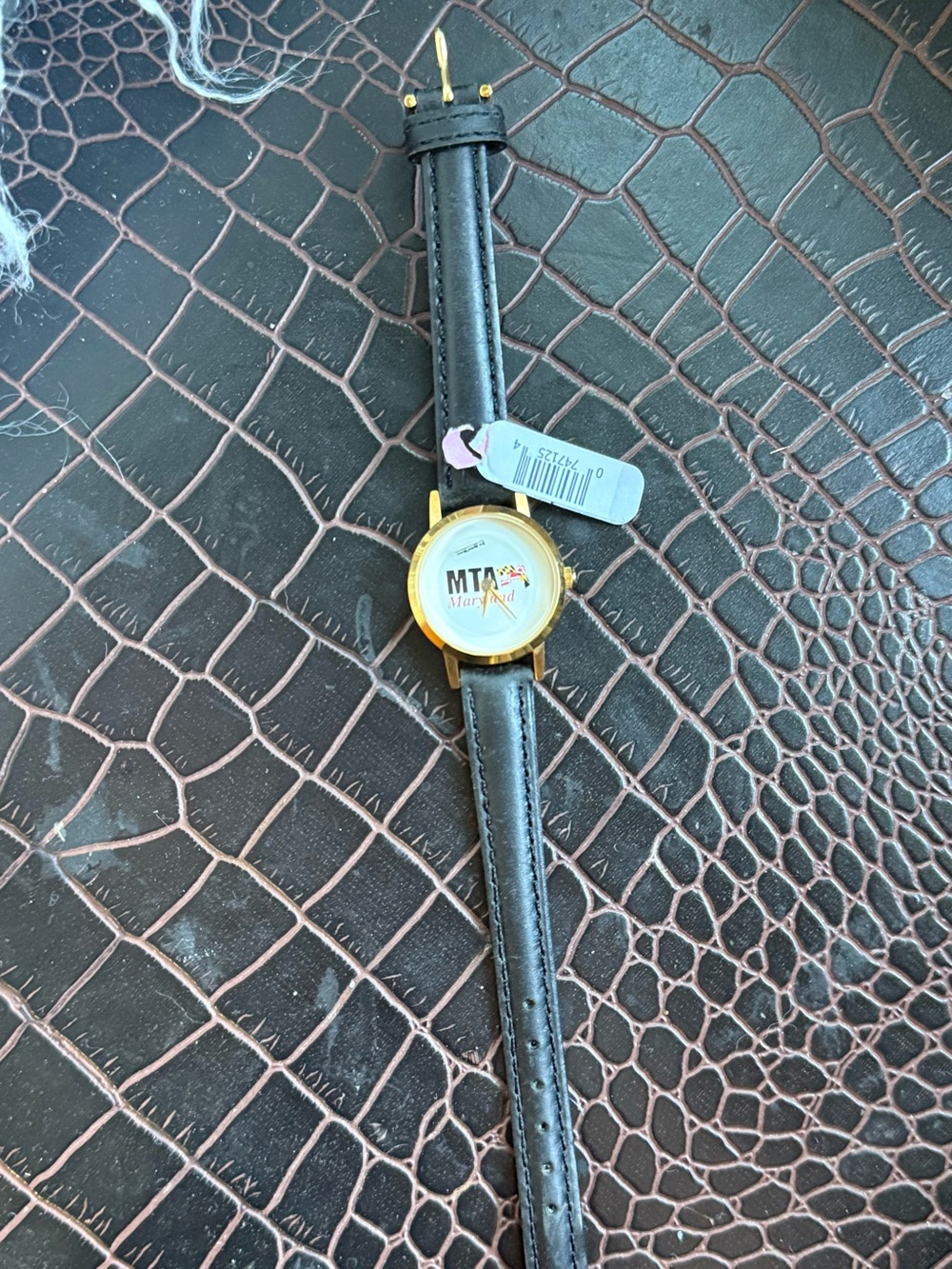 MT Maryland Logo Gold-Tone Watch with Black Strap